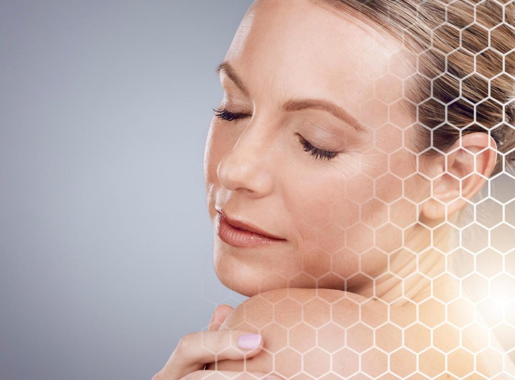 Close-up of a woman with eyes closed, illustrating healthy skin, hydration, and skin barrier renewal with a subtle scientific grid overlay